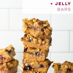 Vegan Peanut Butter and Jelly Bars -- Layers of peanut butter and jelly come together to form these DELICIOUS snack bars! This recipe is so easy to make and is the perfect snack or dessert that both adults and kids will go crazy over. #pbandj #peanutbutter #vegandessert #vegansnack #peanutbutterandjelly | Mindful Avocado