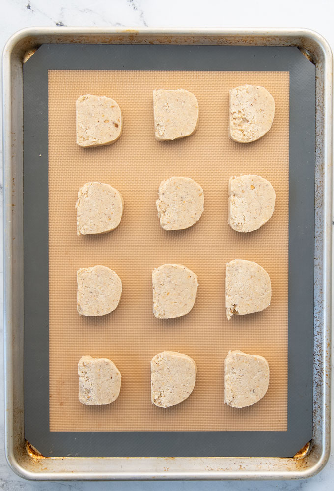 sliced cookies on baking sheet