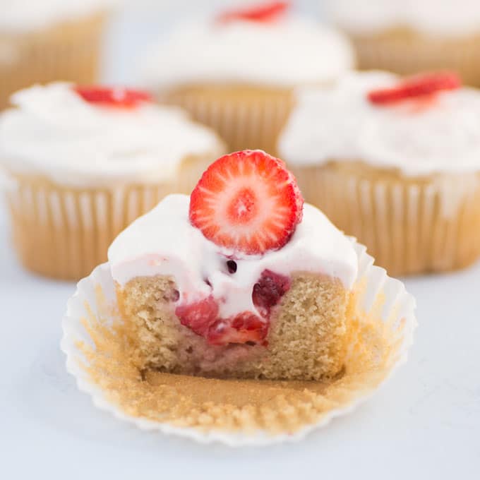 closeup of vegan strawberry shortcake cupcake