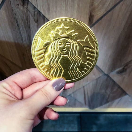 gold coin from starbucks in paris, france