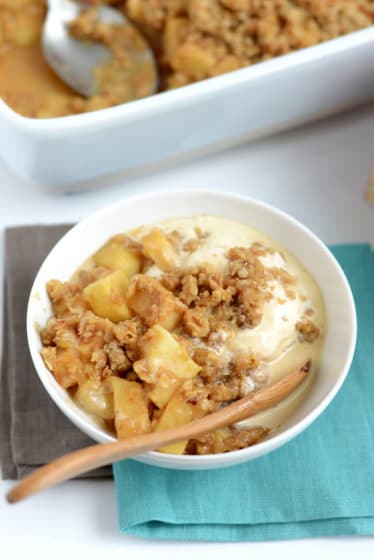 Apple Crisp with vanilla ice cream in a bowl