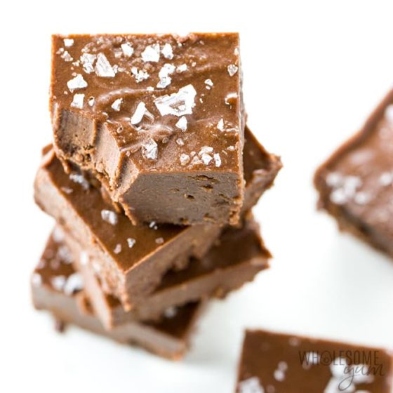 A stack of Easy Chocolate fudge squares topped with sea salt