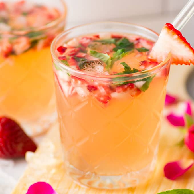kombucha cocktail with vodka, strawberries, and basil