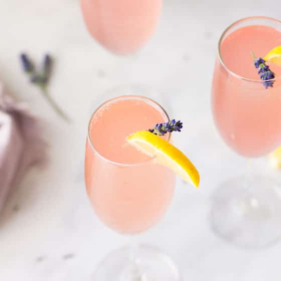 champagne flute of lavender lemonade mimosa