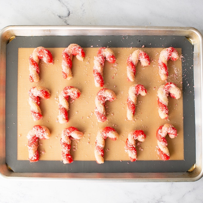 candy cane cookies on baking sheet