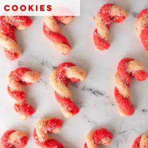 Vegan Candy Cane cookies are PERFECT for any Christmas occasion! Parties, cookie swaps, or Santa's plate on Christmas eve, this recipe is so much FUN to make! #christmascookies #vegancookies #candycanecookies #veganbaking #veganholiday #veganchristmasdessert | Mindful Avocado