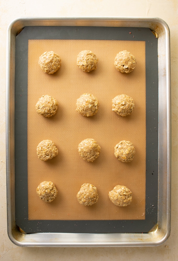 oatmeal cookies on a baking sheet before baking