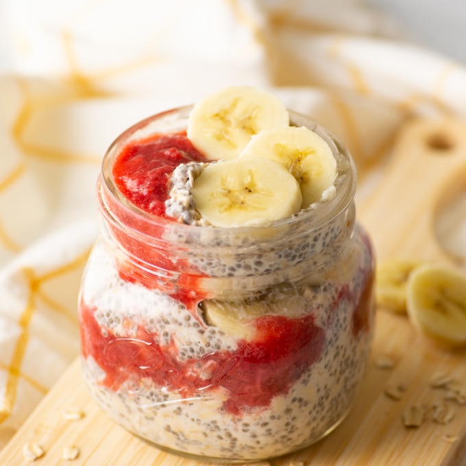 side angle of overnight oats with strawberry and banana