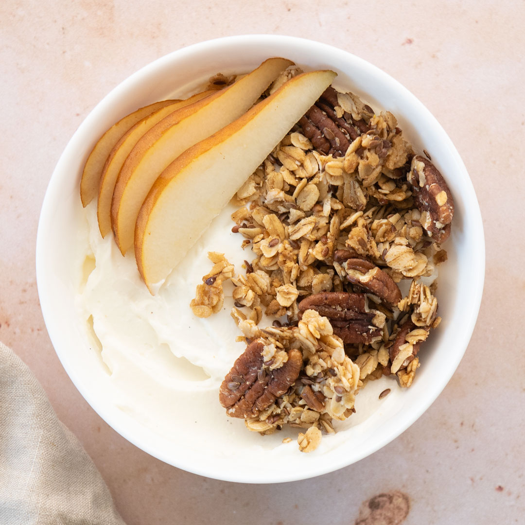 homemade granola with fruit and yogurt in a bowl