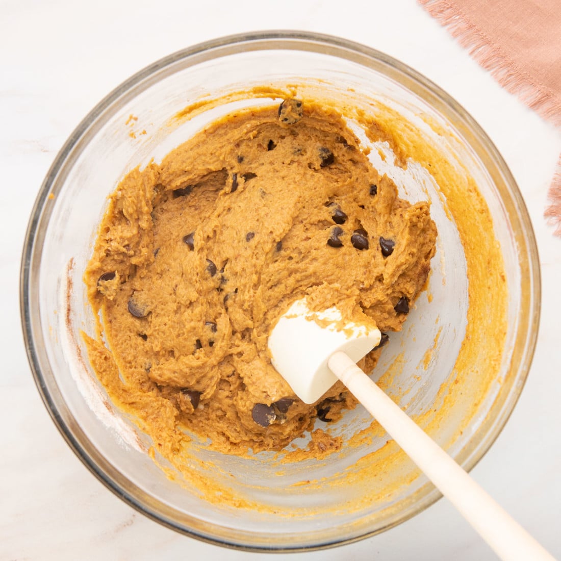 thick pumpkin muffin batter with chocolate chips
