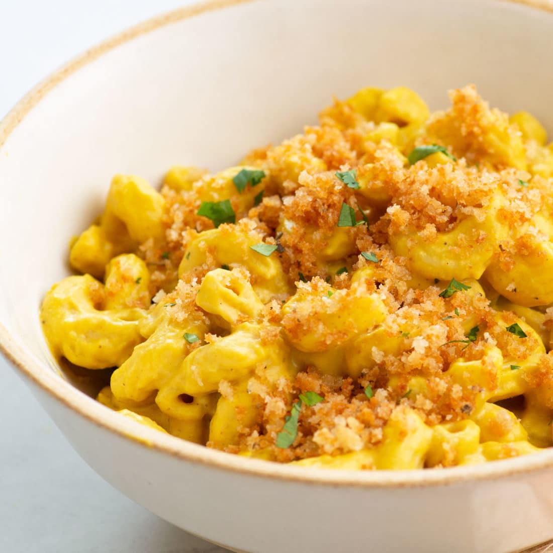 close view of butternut squash mac and cheese with crispy panko topping