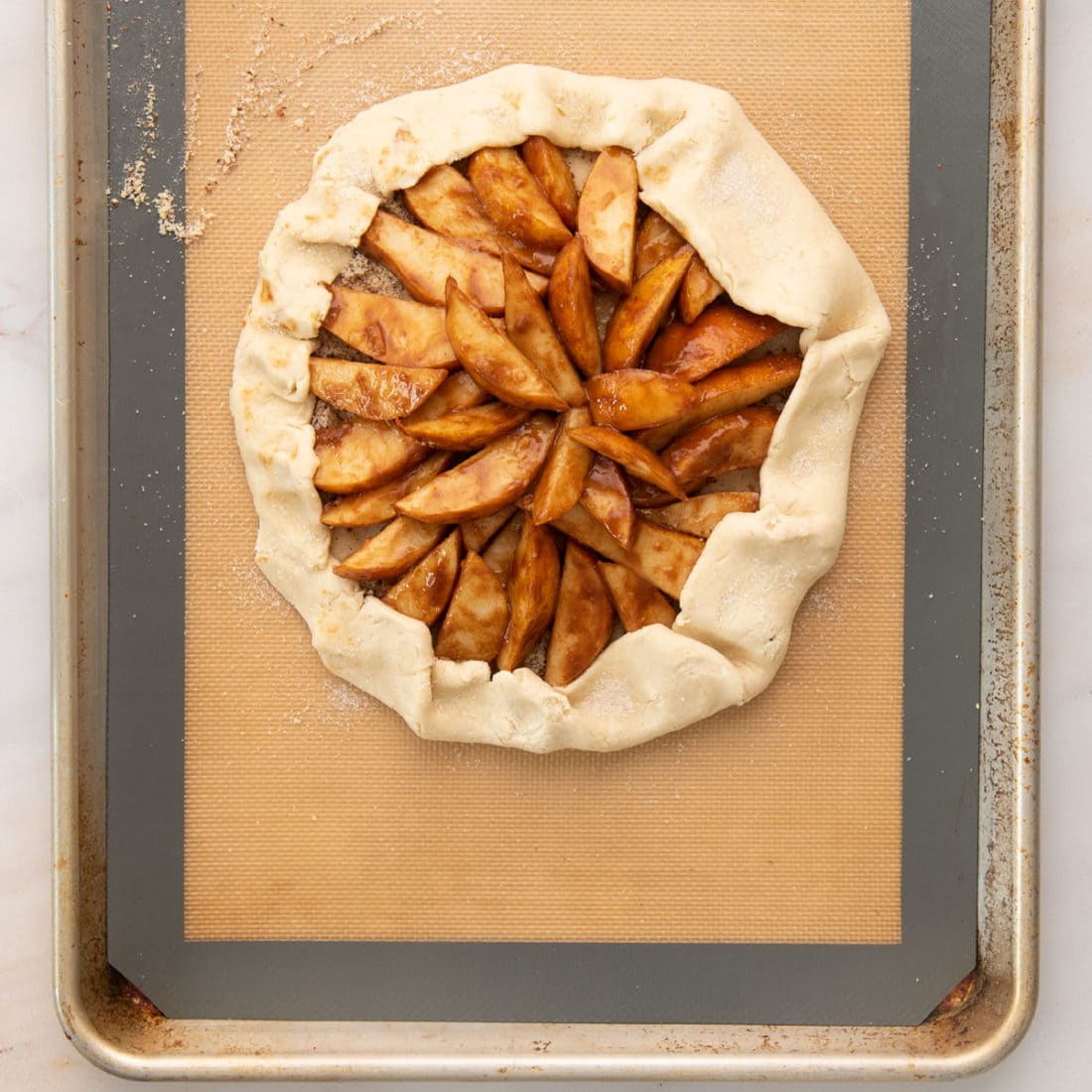 pear galette on baking sheet before going into oven